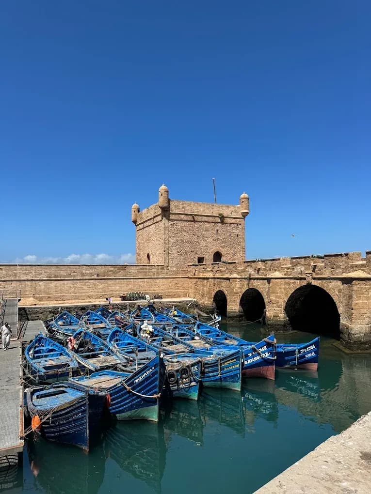 Boats and the Sqala in Essaouira harbour